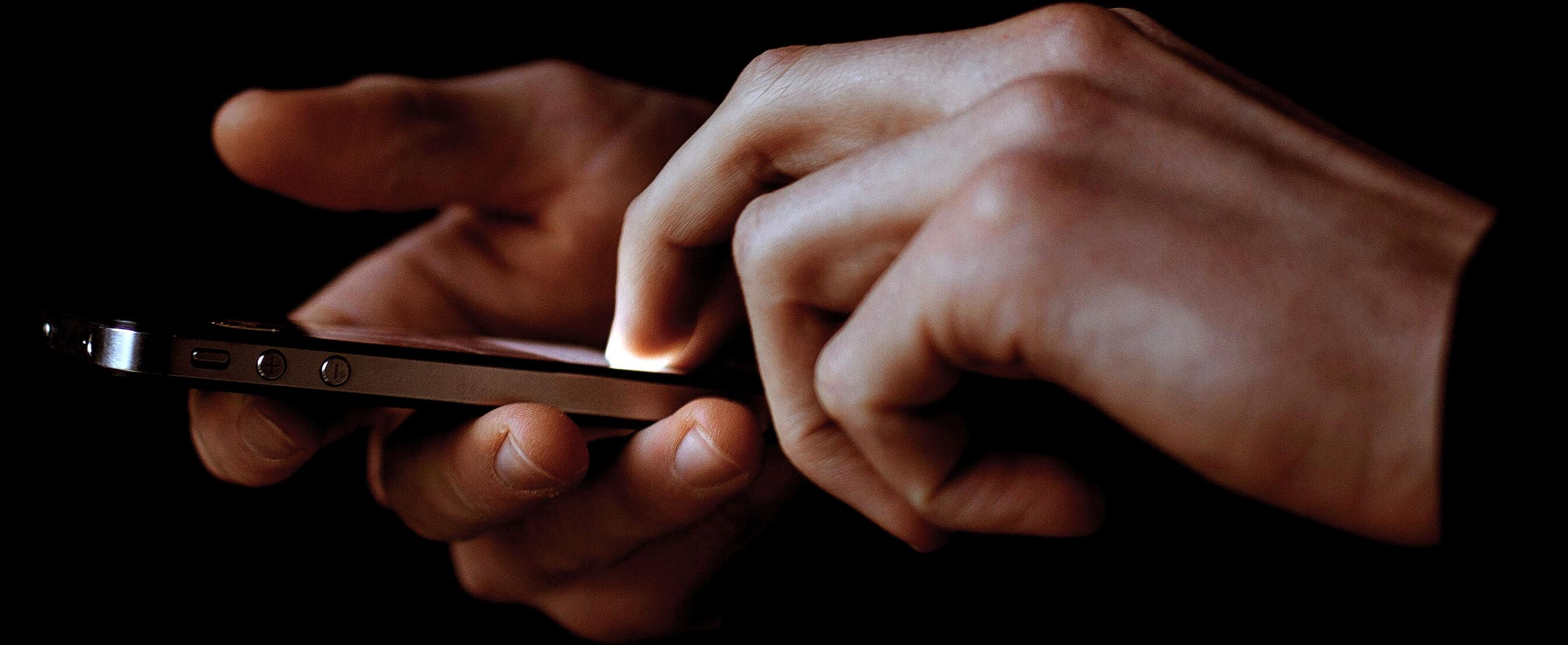 Hands with iPhone